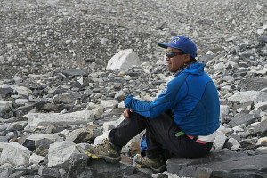 Panuru Sherpa takes a rest during a day of trekking to camp 1 during Alpenglow Expeditions climb Cho Oyu expedition in 2016