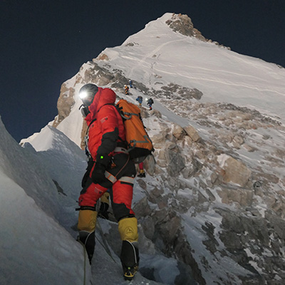 Adrain on summit morning just before dawn
