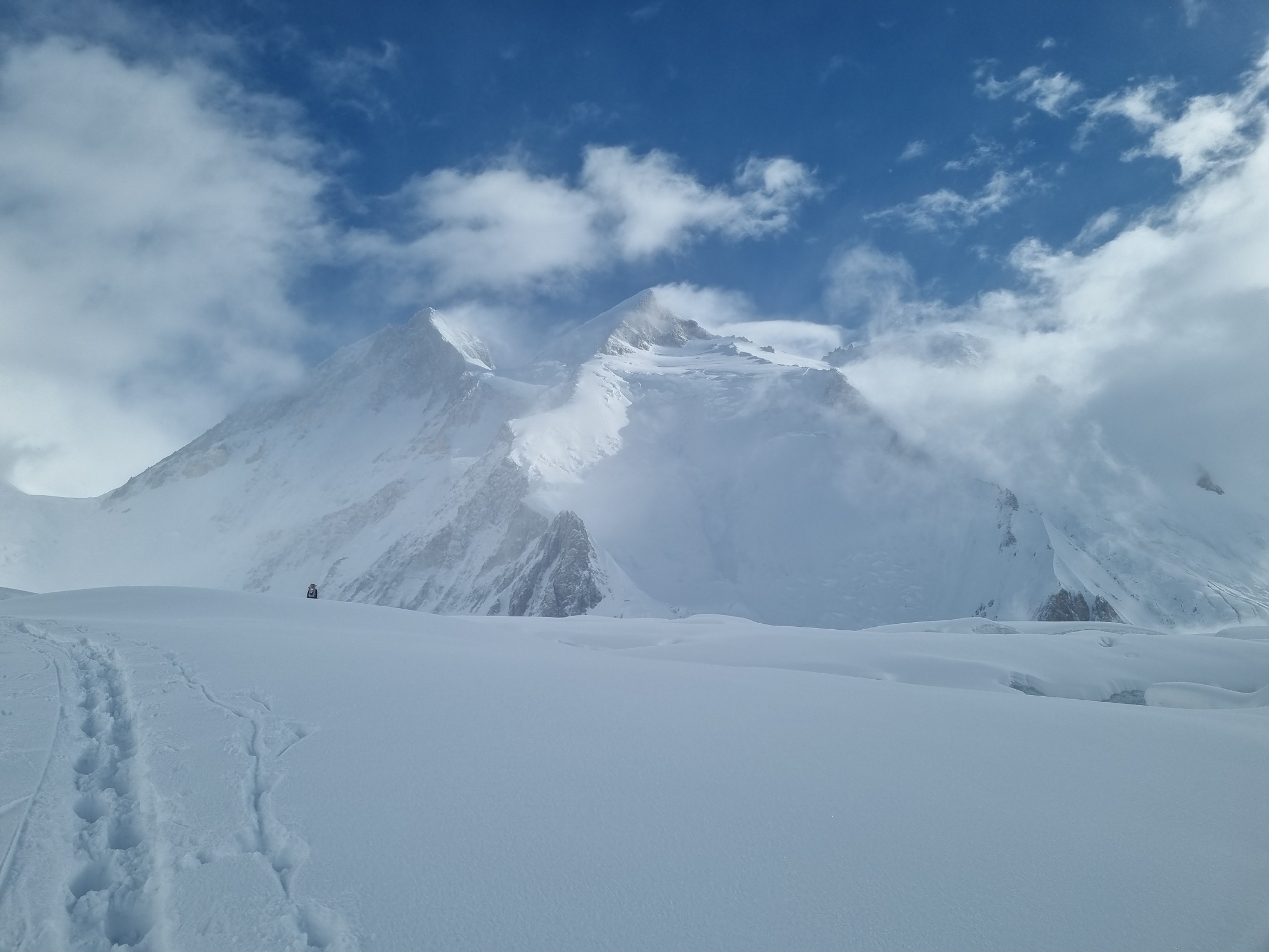 Footprints in the snow on a Gasherbrum II Expedition