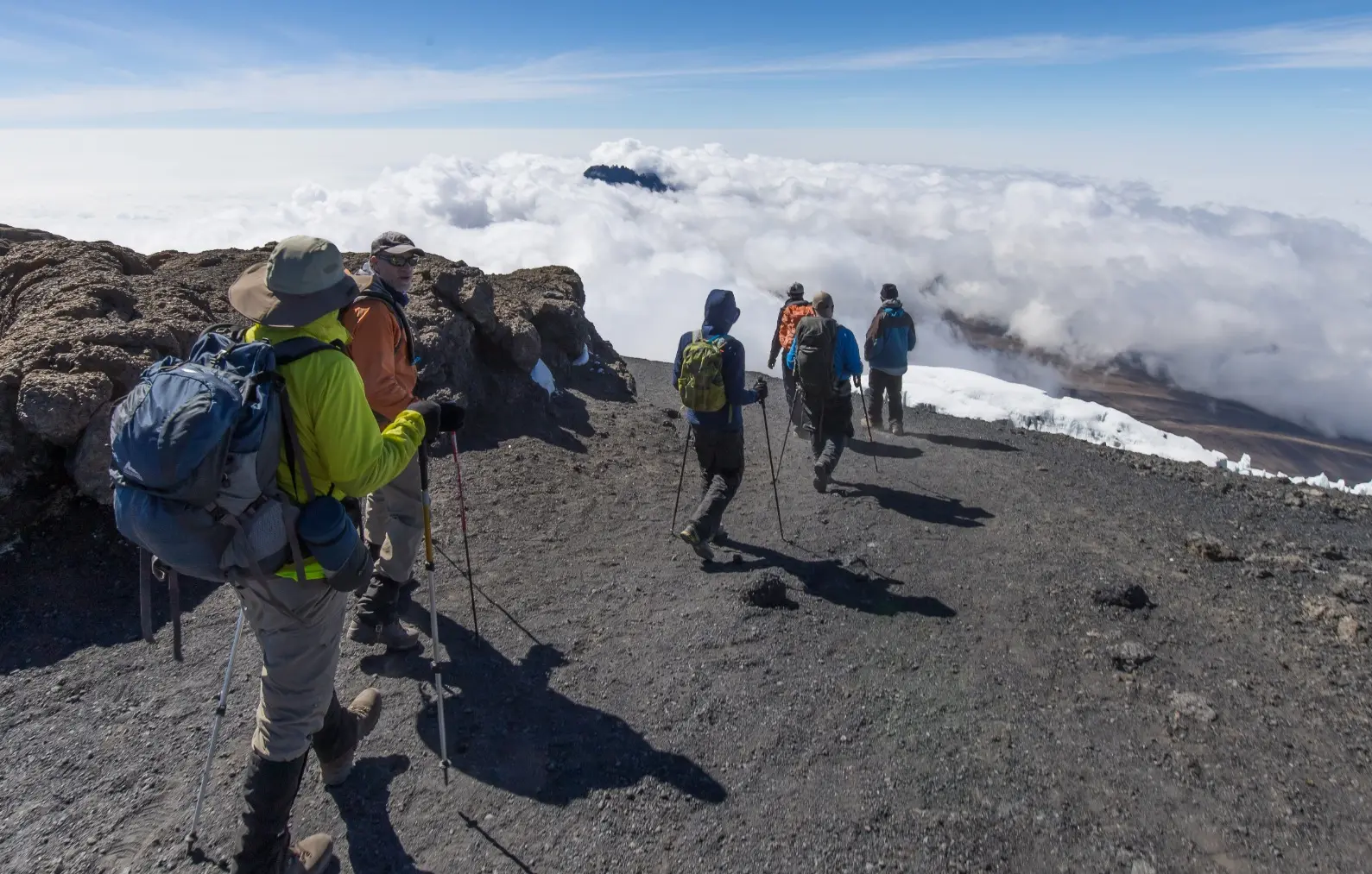 Clients hiking up Kilimanjaro