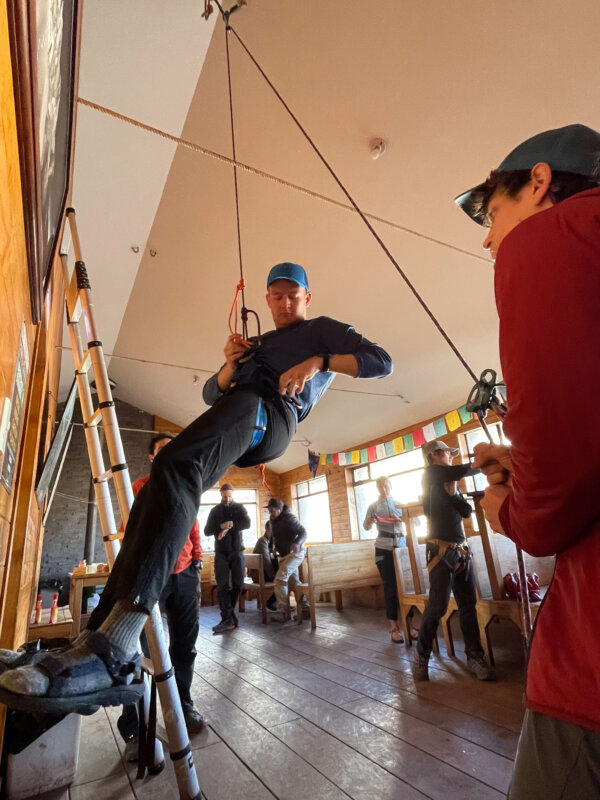 Intro to high-altitude mountaineering students learning rope skills during Alpenglow Expeditions' Ecuador Climbing School.