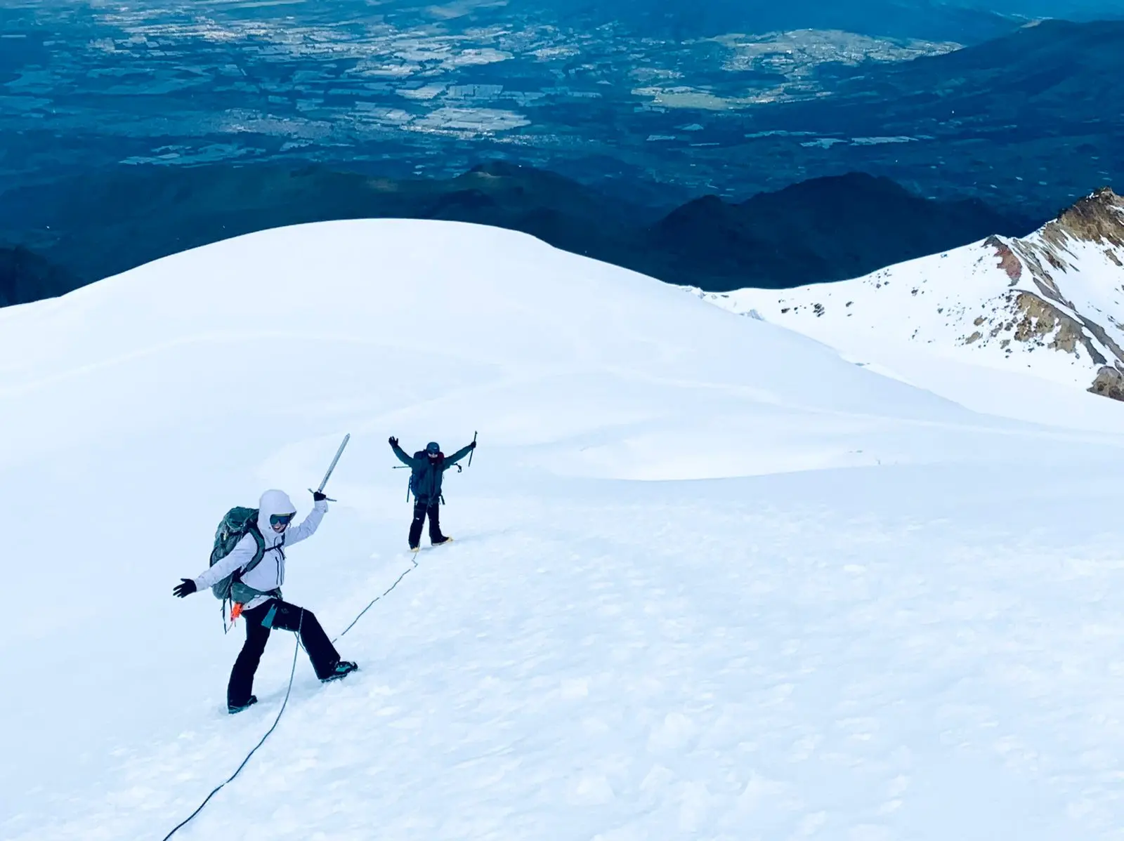 Intro to high-altitude mountaineering students learning glacier skills during Alpenglow Expeditions' Ecuador Climbing School