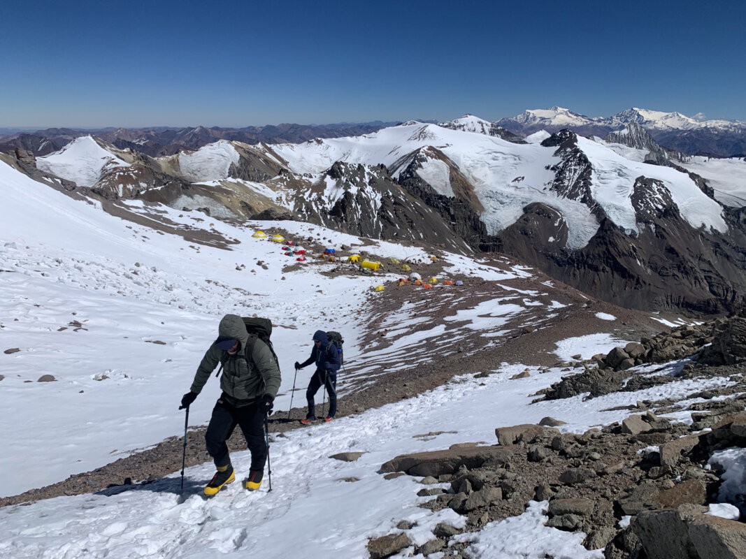 Two mountaineers climbing up Aconcagua