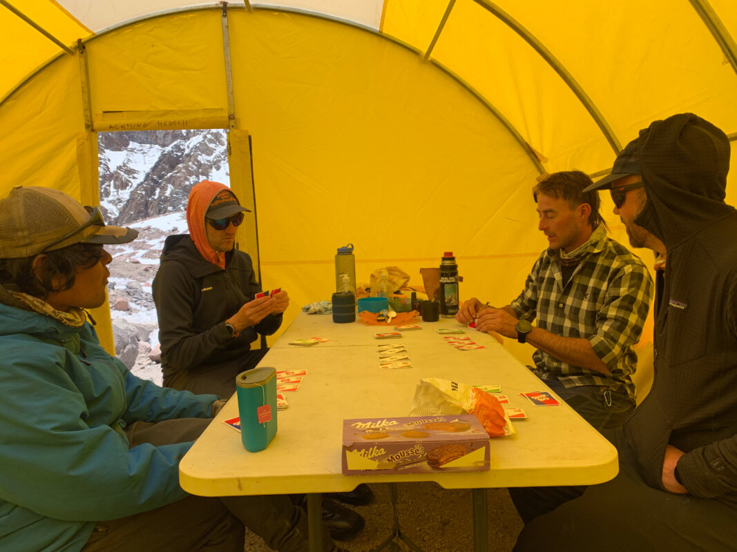 Clients eating in a tent at Aconcagua base camp
