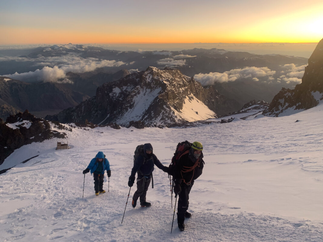 Three mountaineers climbing up Aconcagua via the 360 Route