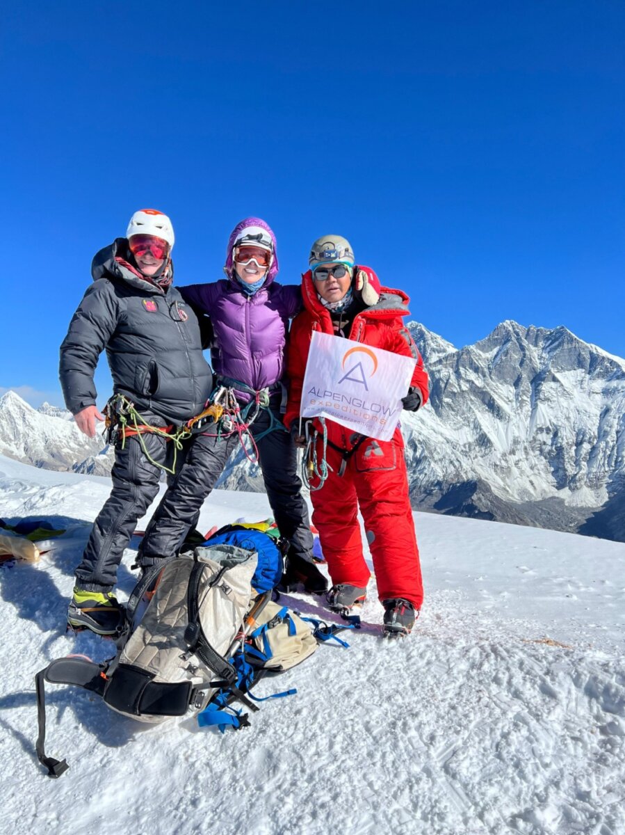 A group of clients on the summit of Ama Dablam