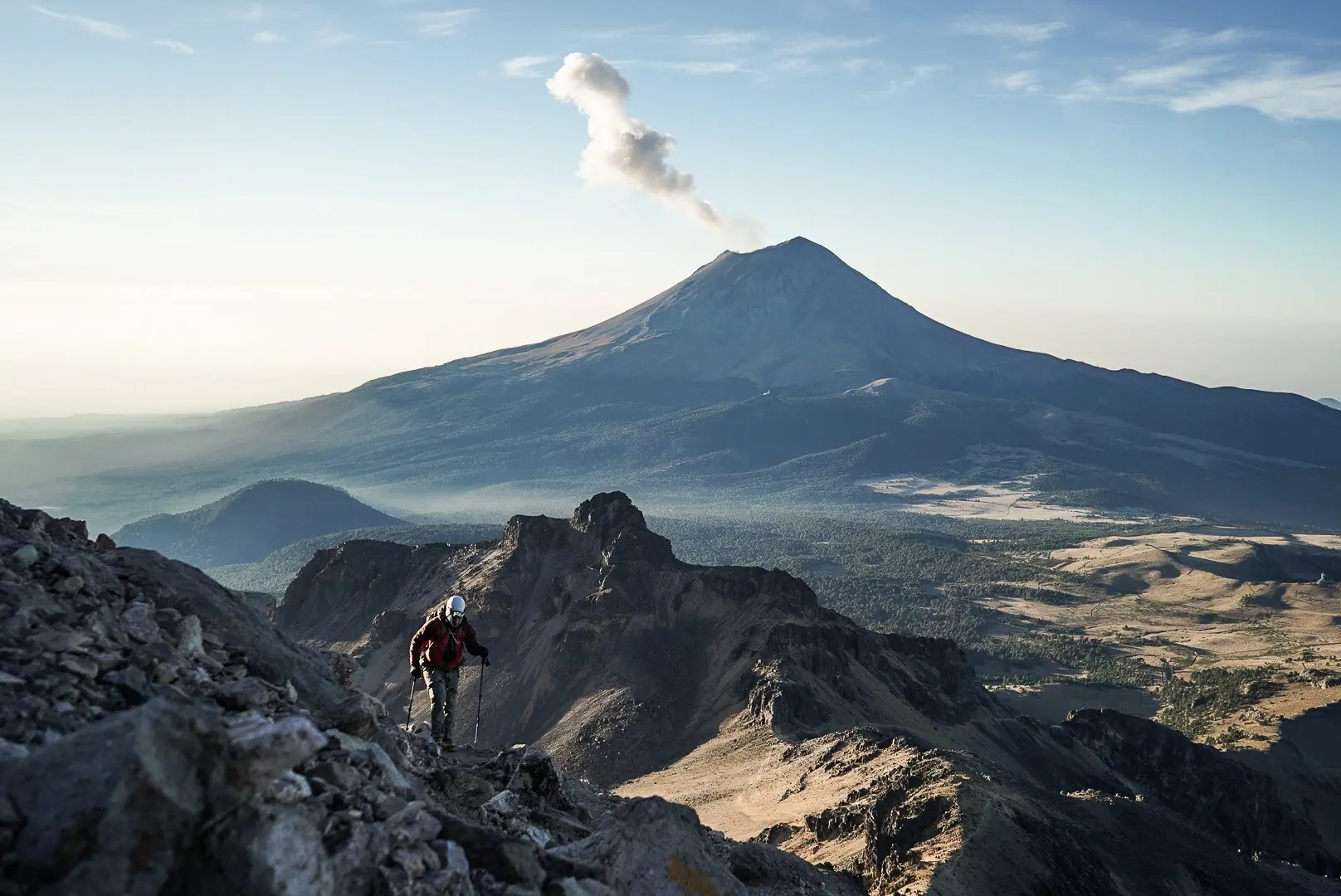 A climber hiking during a guided Volcanoes of Mexico Expedition