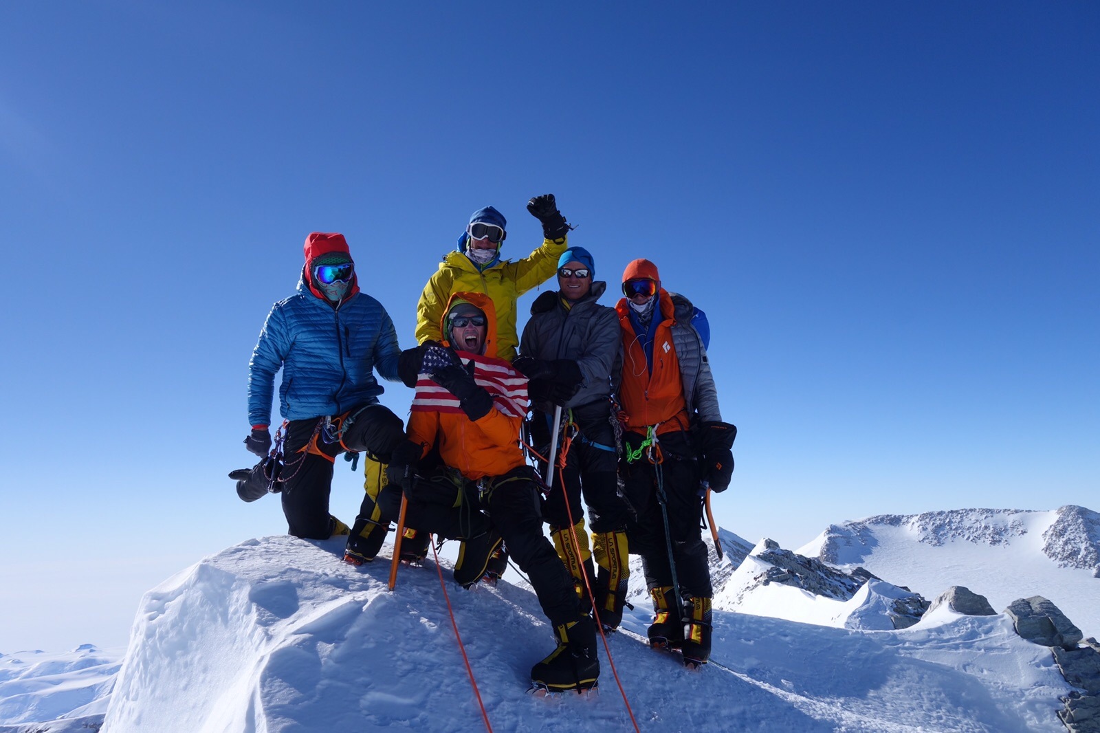 Adrian Ballinger and team on mountain summit