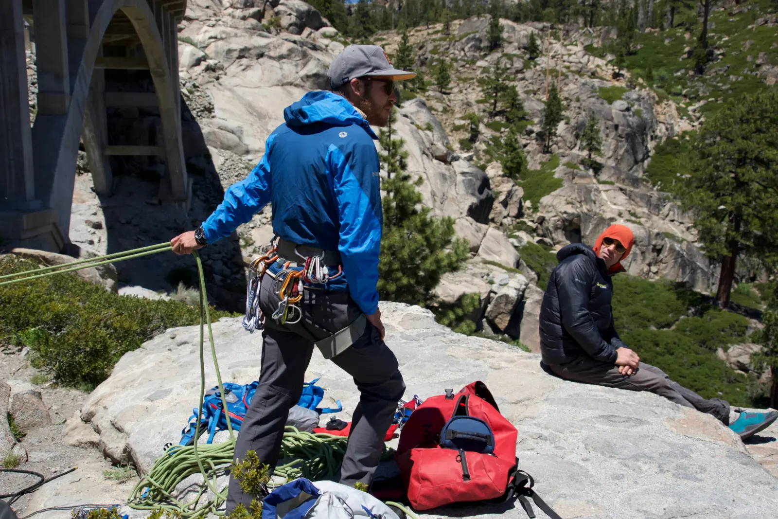 Rock climbing guide teaching a rock climbing course at Donner Summit in Lake Tahoe.