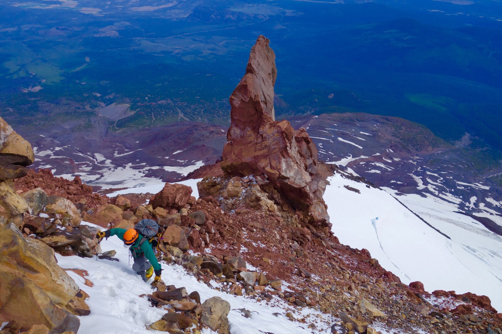 A mountaineer climbing the West Face of Mount Shasta with Alpenglow Expeditions