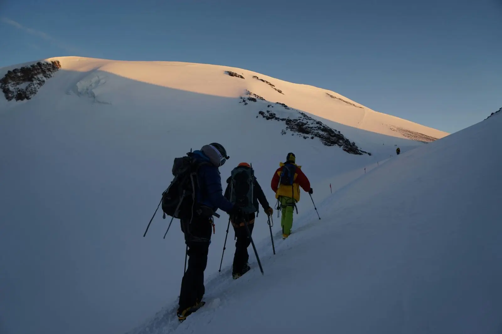 Clients hiking up during a guided Mount Elbrus Expedition