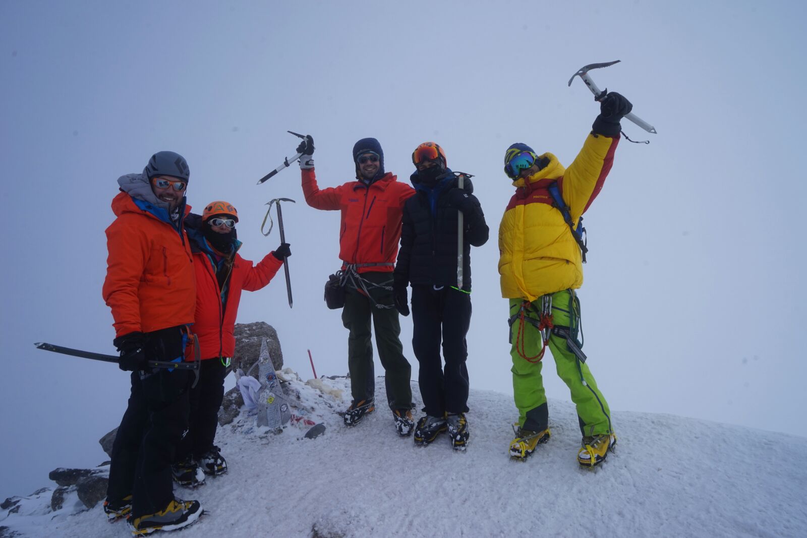 Clients on the summit of Mount Elbrus during a guided Mount Elbrus Expedition