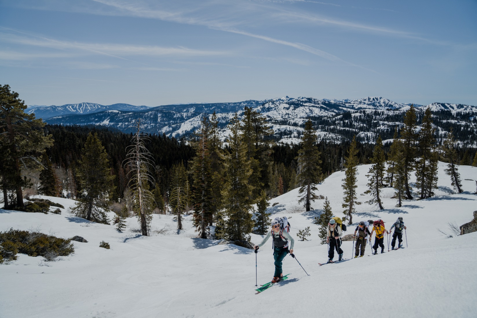 Clients skinning up during a private backcountry ski guiding in lake tahoe with professional mountain guides