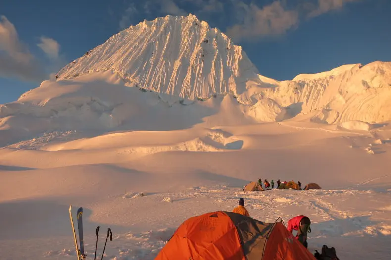 Embark on an extraordinary journey with Alpenglow Expeditions' Alpamayo climbing trip. Test your advanced alpine skills on the world's most beautiful mountain, where steep ice and snow climbing meet the challenges of high altitude. A pinnacle for fledgling high-altitude climbers, Alpamayo's allure is undeniable, earning its reputation as 'the most beautiful mountain in the world.' Join us for an unforgettable ascent.