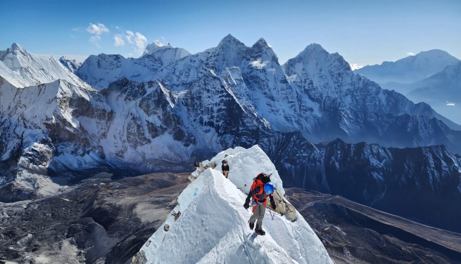 Climbers on the summit of Ama Dablam.