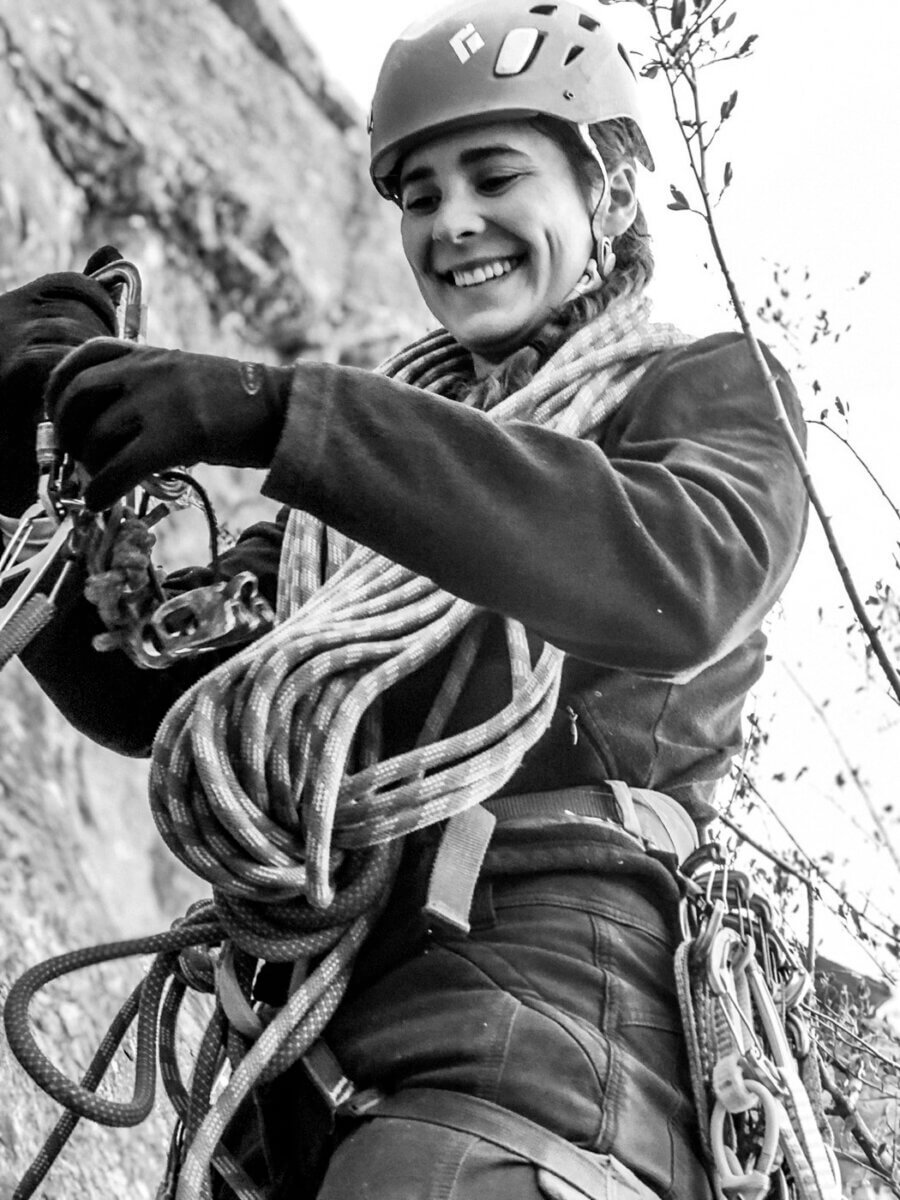 Female rock climbing guide sorting gear in Lake Tahoe