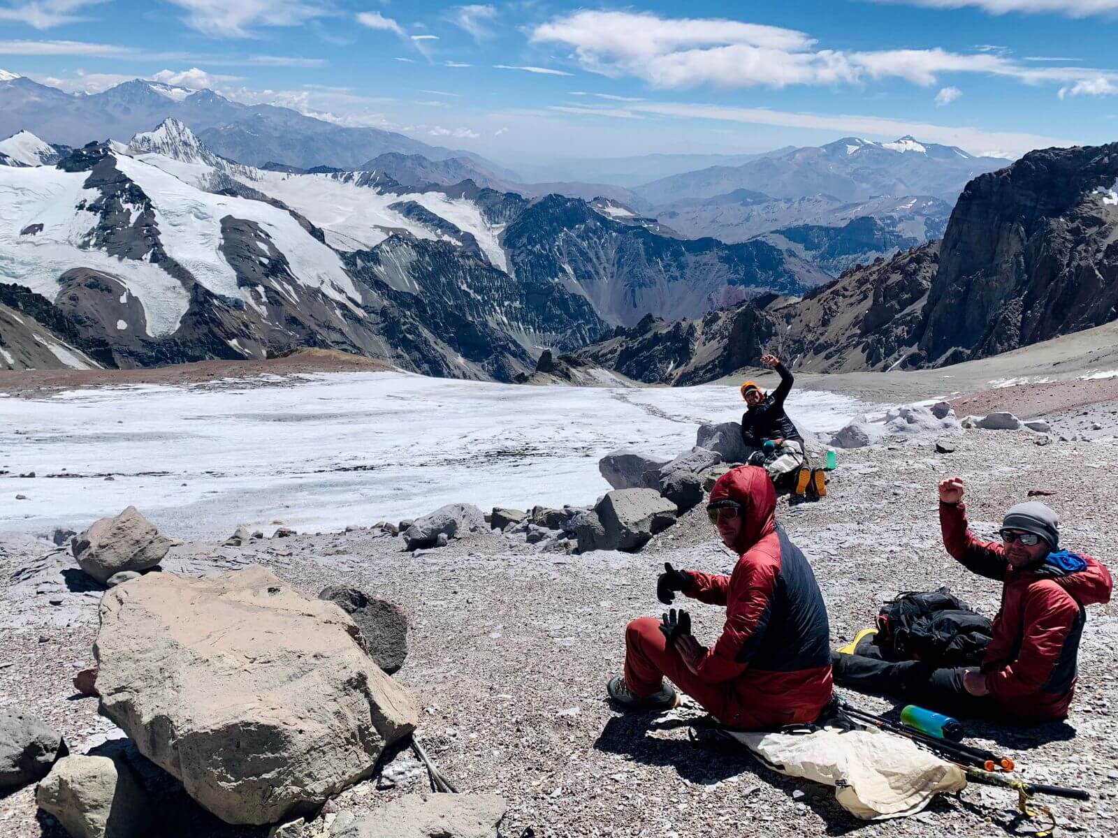 Climbers sit on the upper slopes of Aconcagua.