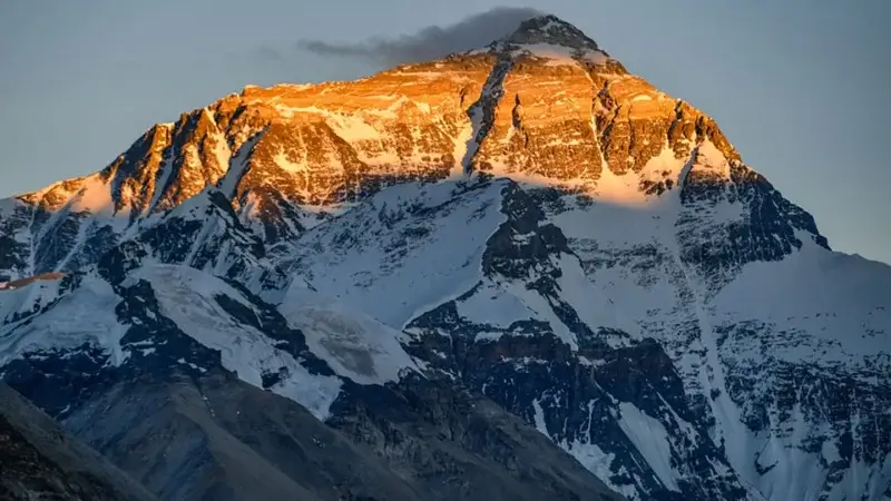 The sun shining on the North Face of Mt. Everest.