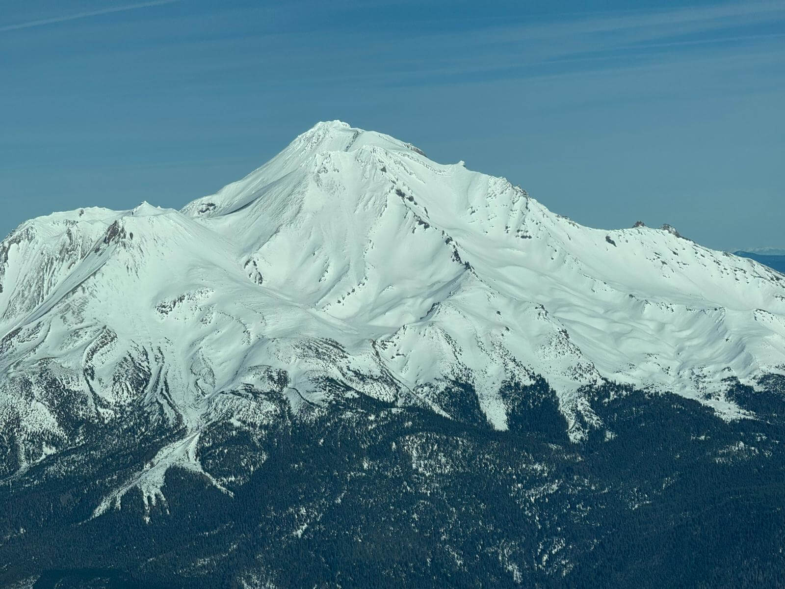 Aerial view of Mt. Shasta, taken by Alpenglow Expeditions owner and Founder Adrian Ballinger